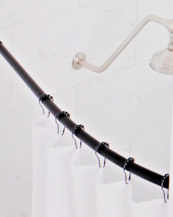 Upgrade your shower space with an adjustable curved rod